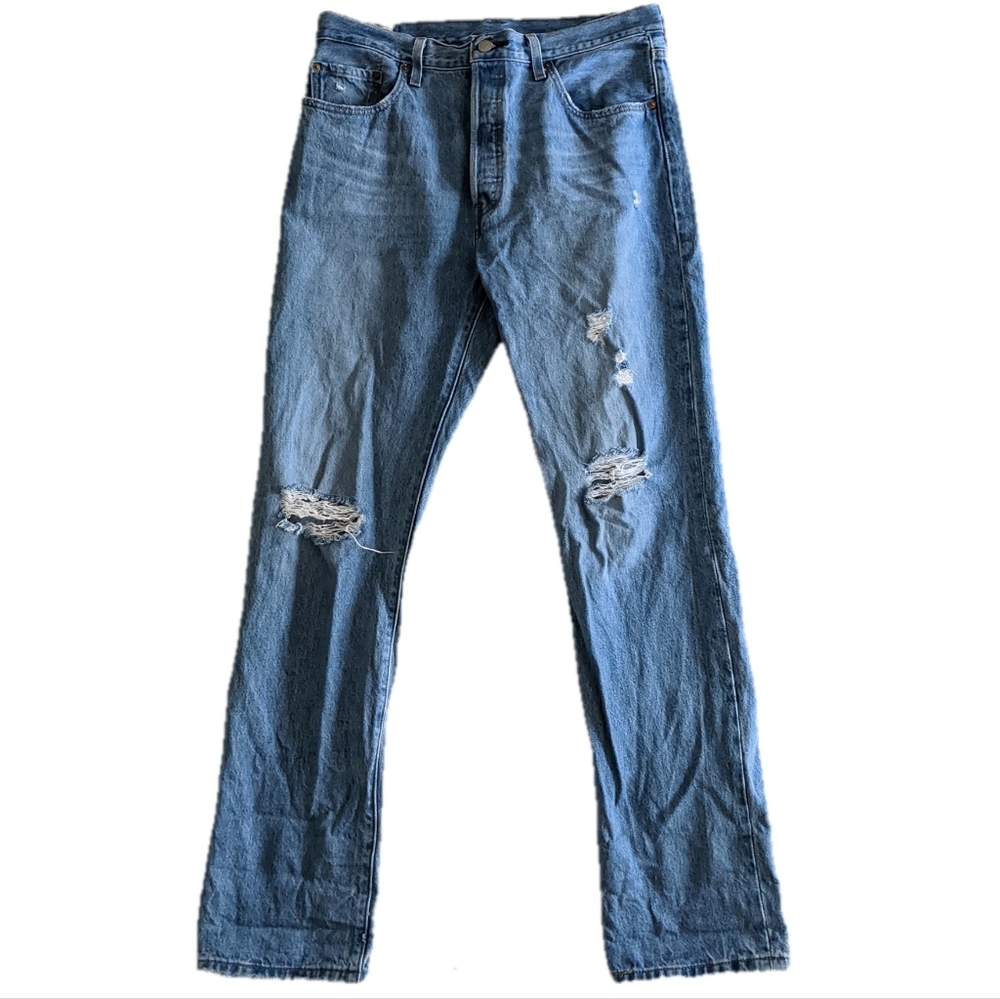 Levi's 501 ripped straight leg blue jeans